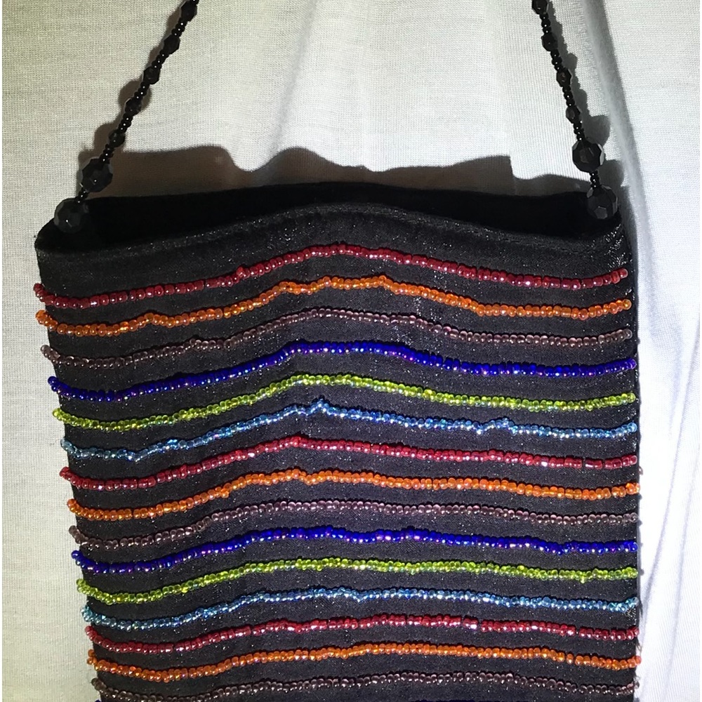 Evening Bag, black beaded chain. 6 1/2” high x 5 1/2” wide.